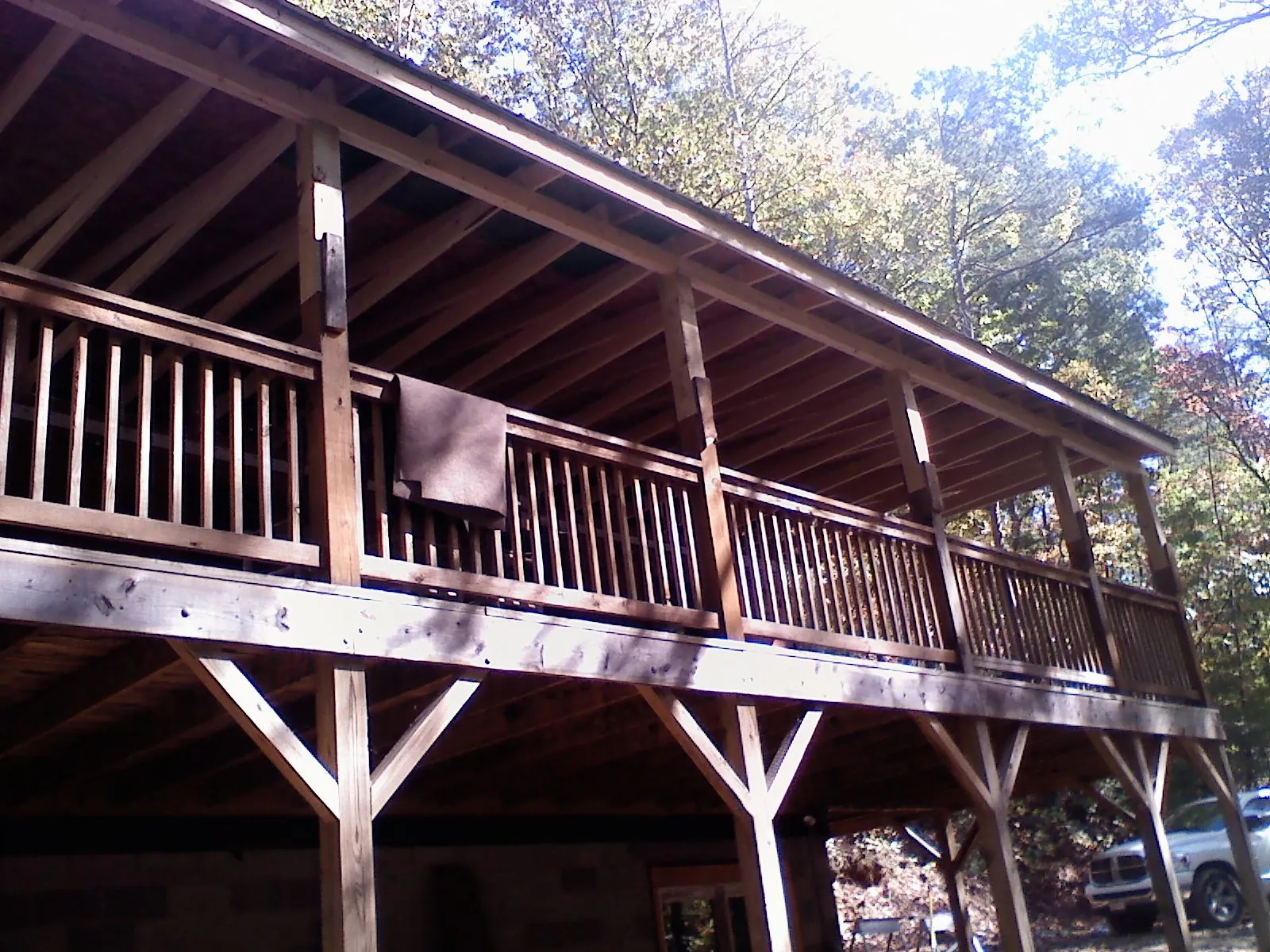 Timber framing under a new elevated porch and deck — Roof Leak Repair in Ozark by Roofing Brothers